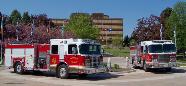 Two firetrucks parked in front of the Civic Centre