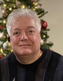 Man smiling for photo for Sports Hall of Fame