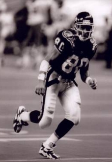 Norm Casola running on the football field
